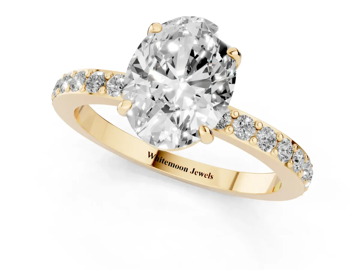 Oval Cut Diamond Pavé Engagement Ring with Round Accents and Prong Setting Yellow gold