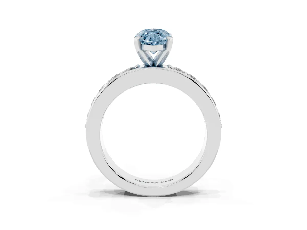 Fancy Blue Marquise Cut Diamond Engagement Ring with Channel Set Round Band and Prong Setting Platinum
