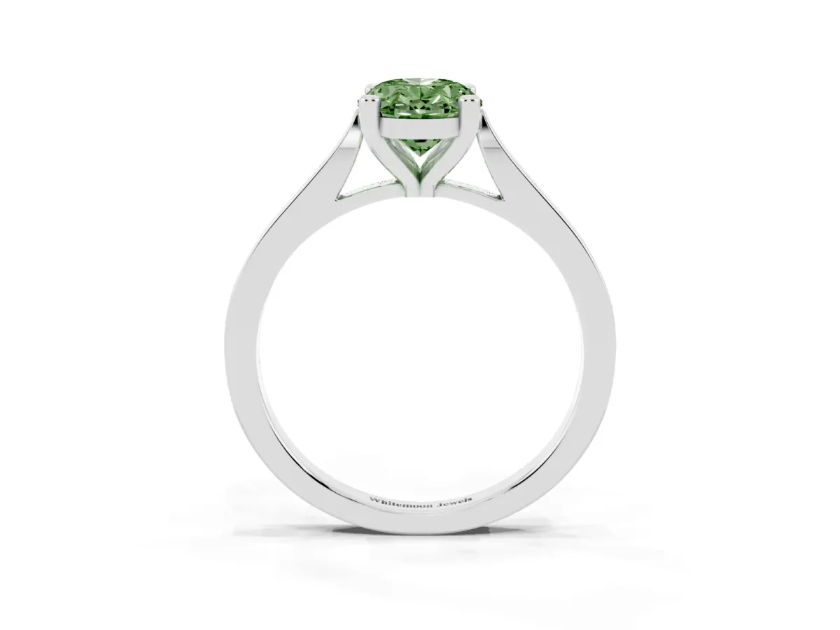 Fancy Green Oval Cut Solitaire Diamond Ring with Four-Prong Setting and Tapered Band Platinum