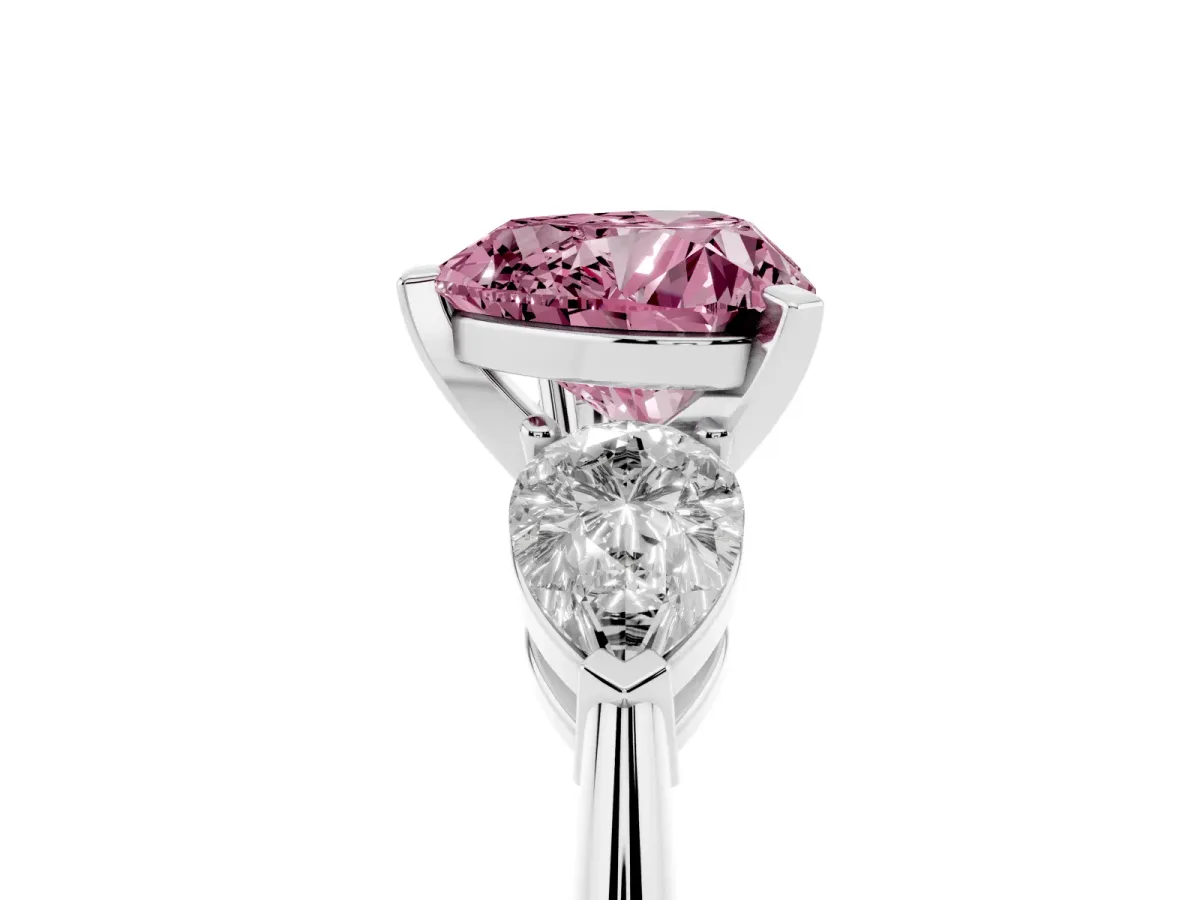 Fancy Pink Three-Stone Heart Cut Diamond Ring with Pear Side Stones and Four-Prong Setting Silver