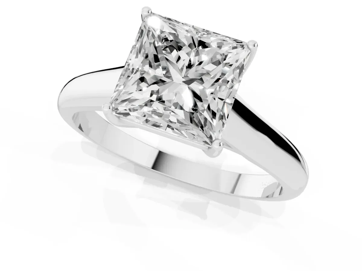 Princess Cut Solitaire Engagement Ring with Tapered Band and Four-Prong Setting Silver