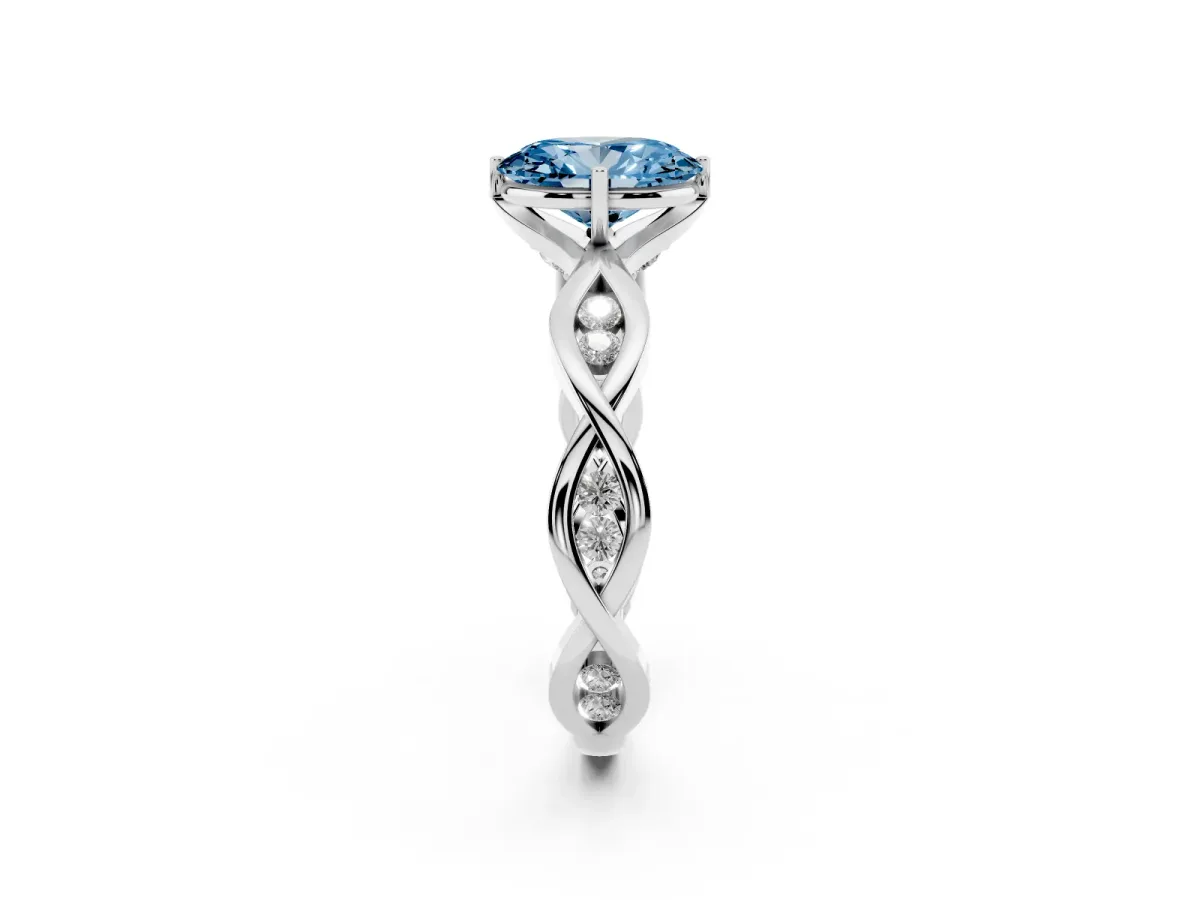 Fancy Blue Oval Cut Solitaire Twist Band with Leaf Prong Setting Silver