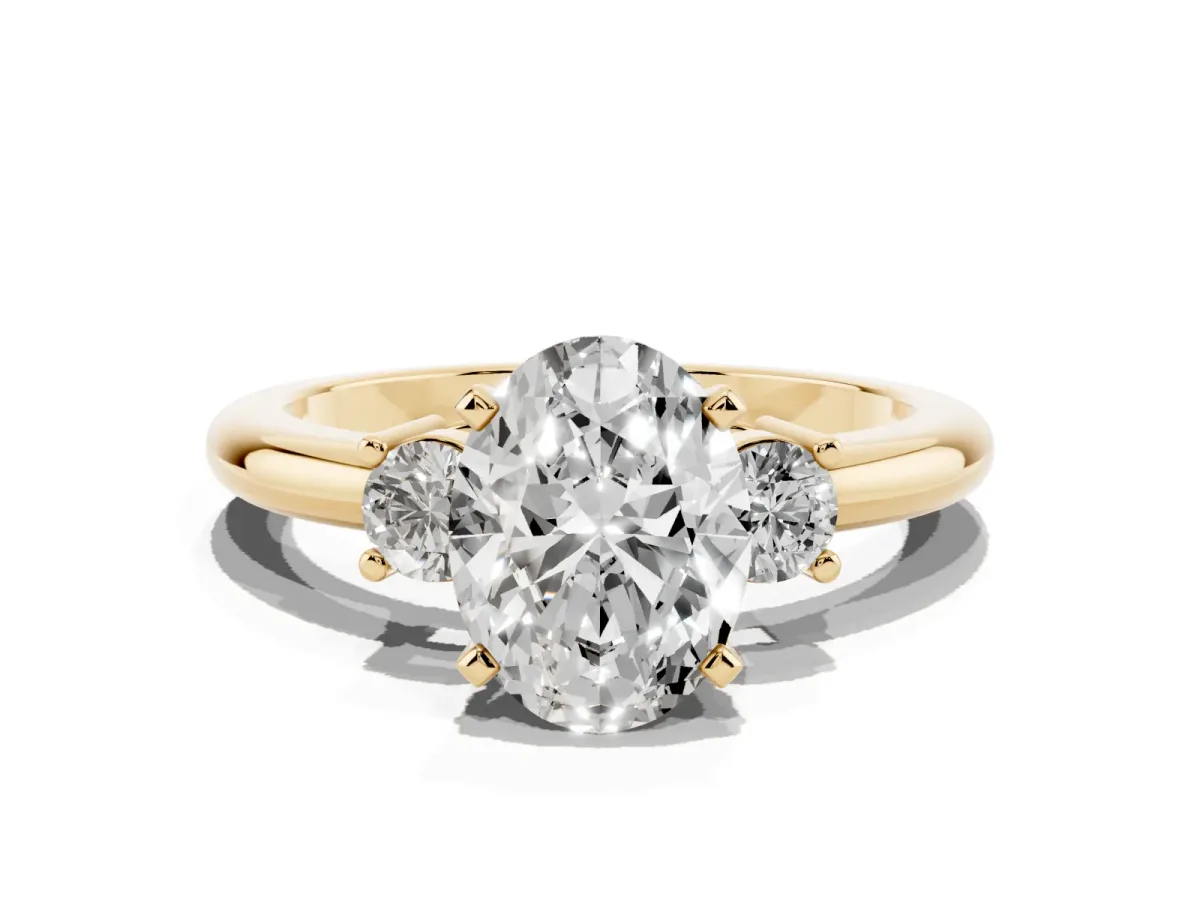 Three-Stone Oval Cut Cut Diamond Solitaire with Prong Setting and Classic Band Yellow gold
