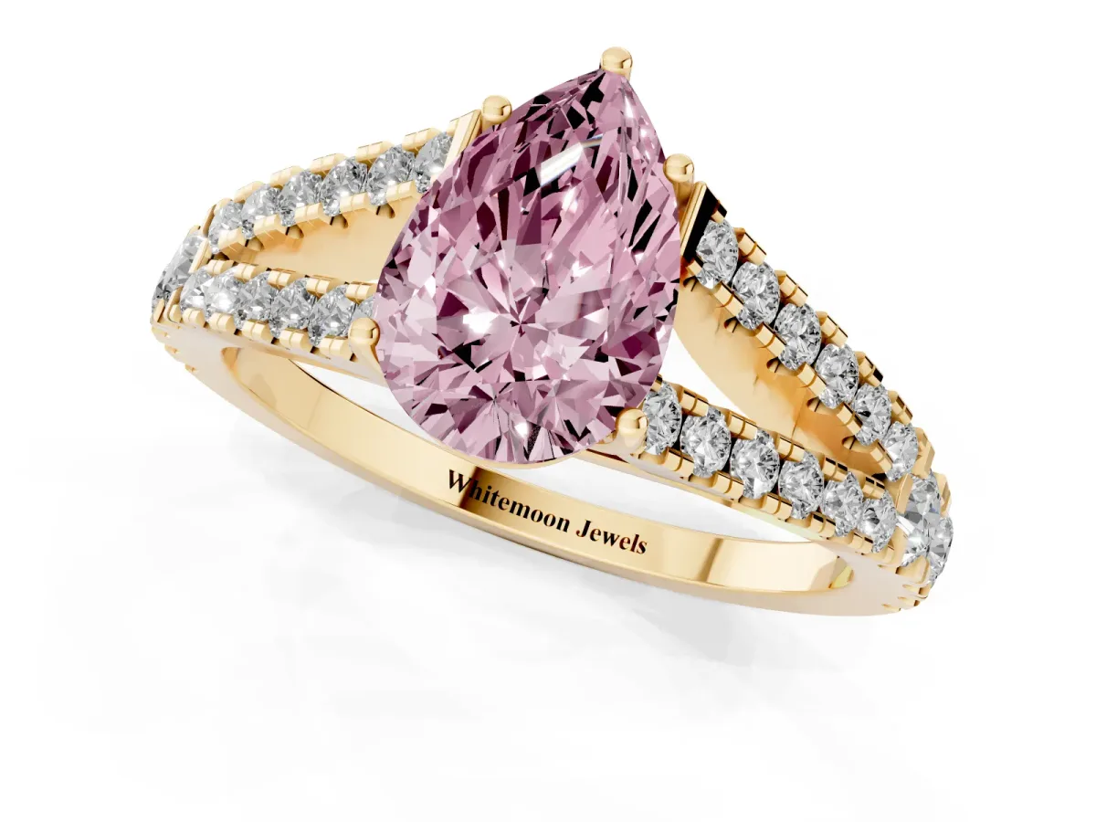 Fancy Pink Pear Cut Diamond Split Shank Engagement Ring with Round Pavé and Prong Setting Yellow gold