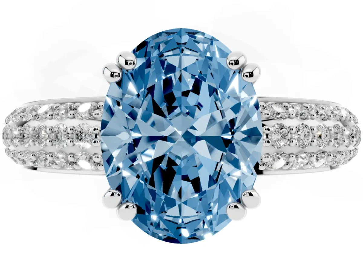 Fancy Blue Oval Cut Diamond Solitaire Ring with Multi-Row Round Pavé Band and Prong Setting Silver