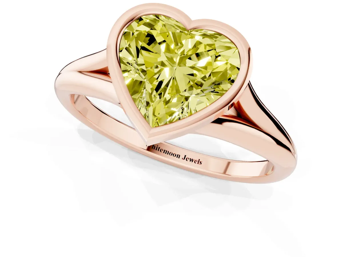 Fancy Yellow Bezel Set Heart Cut Cut Solitaire Ring with Tapered Band Rose gold