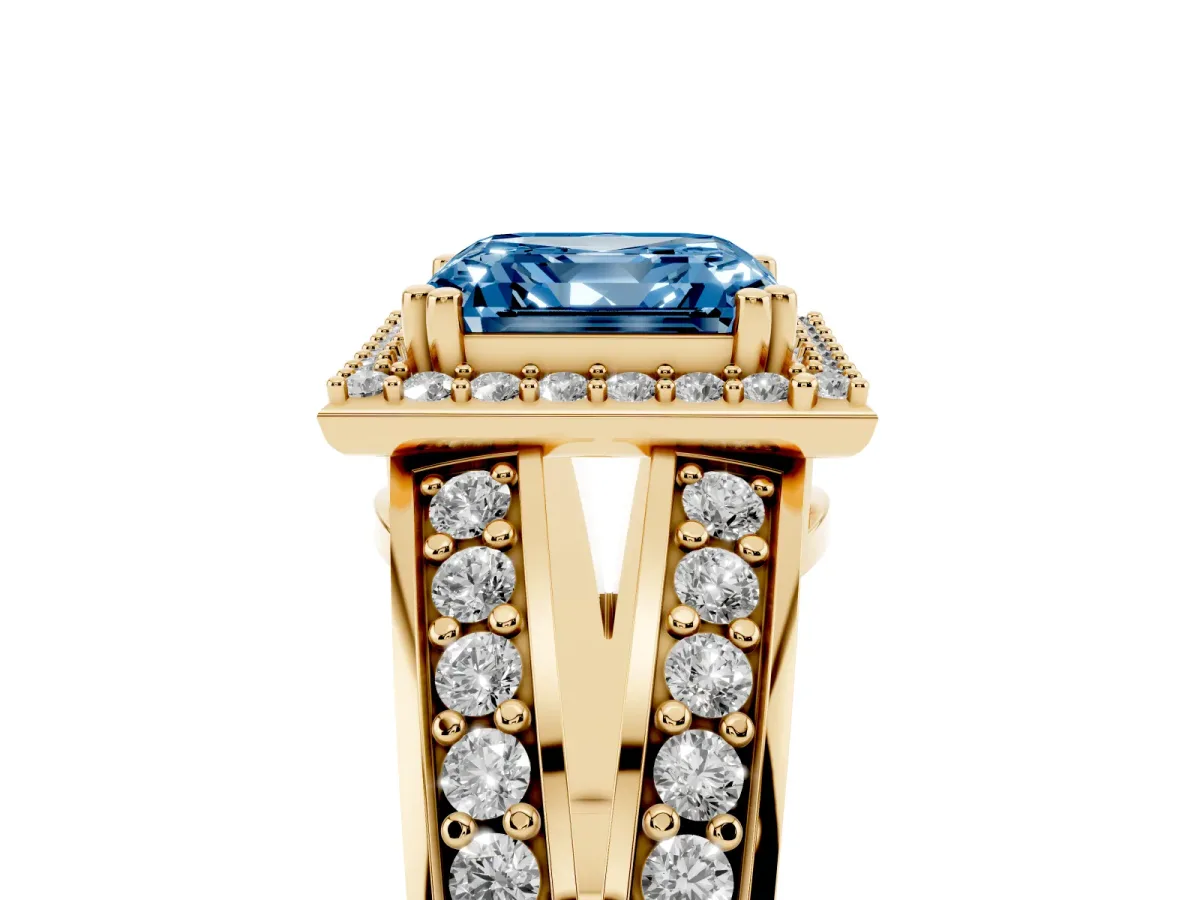 Fancy Blue Asscher Cut Diamond Halo Ring with Split Shank Pavé Band and Four-Prong Setting Yellow gold