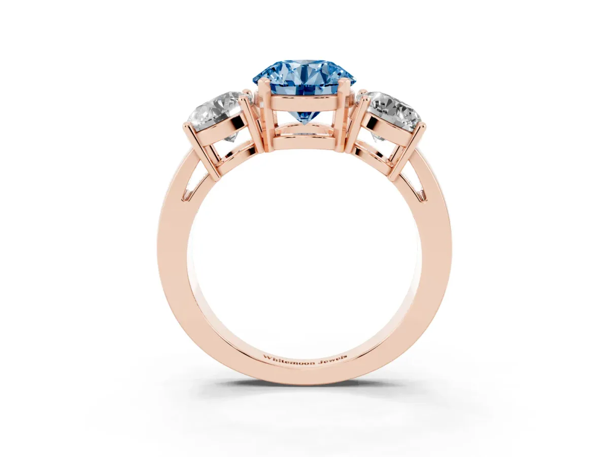 Fancy Blue Three-Stone Round Cut Diamond Ring with Round Side Stones, Classic Band, and Four-Prong Setting Rose gold