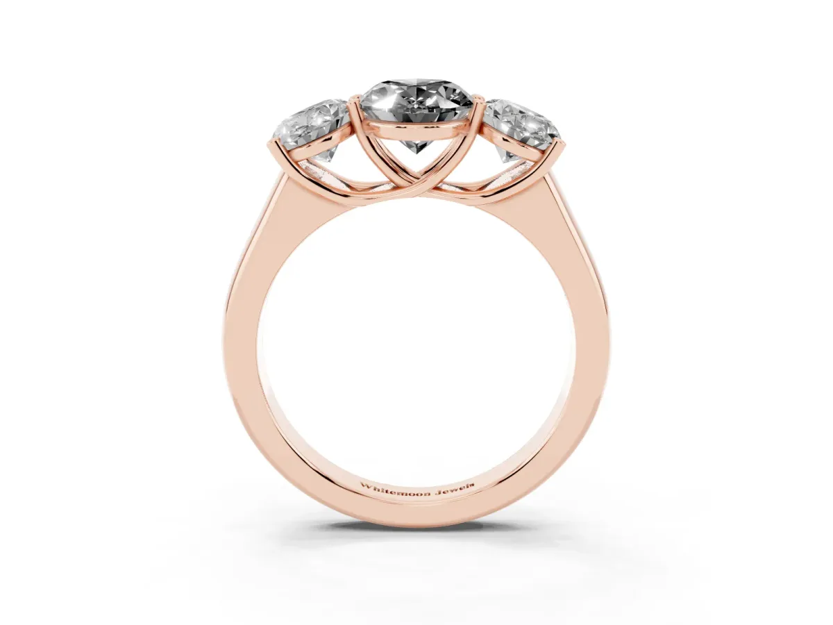 Fancy Black Oval Cut Three-Stone Diamond Ring with Prong Setting on a Classic Band Rose gold