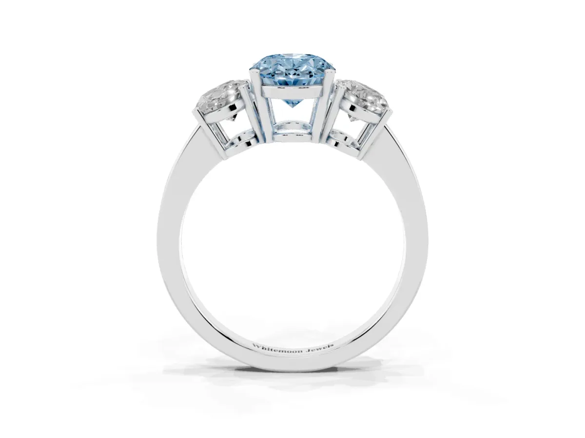 Fancy Blue Three-Stone Oval Cut Cut Diamond Engagement Ring with Flat Band and Four-Prong Setting Silver