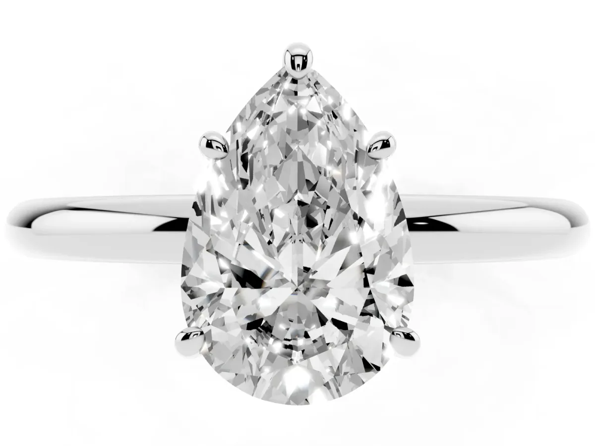 Pear Cut Solitaire Diamond Ring with Four-Prong Setting on a Plain Band Silver