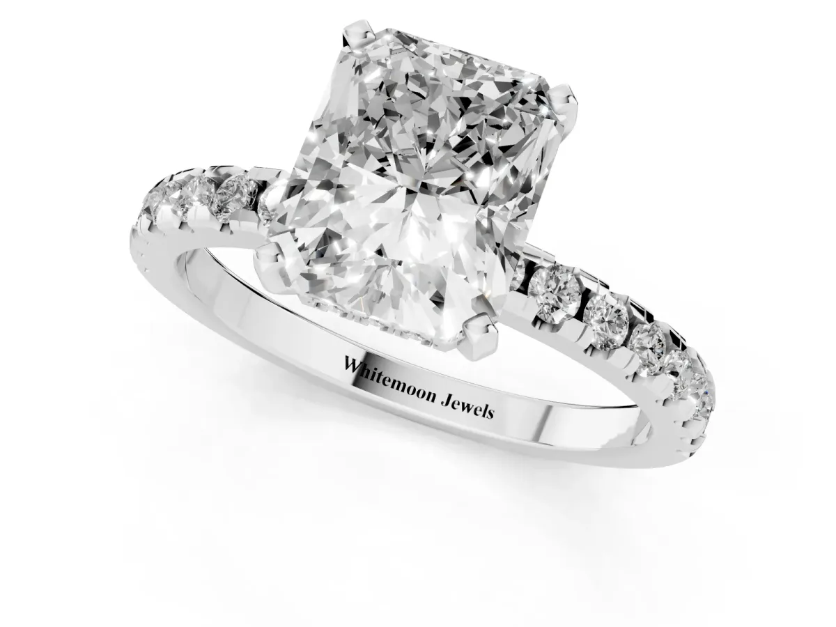 Radiant Cut Diamond Solitaire Ring with Round Pavé Band and Four-Prong Setting Silver