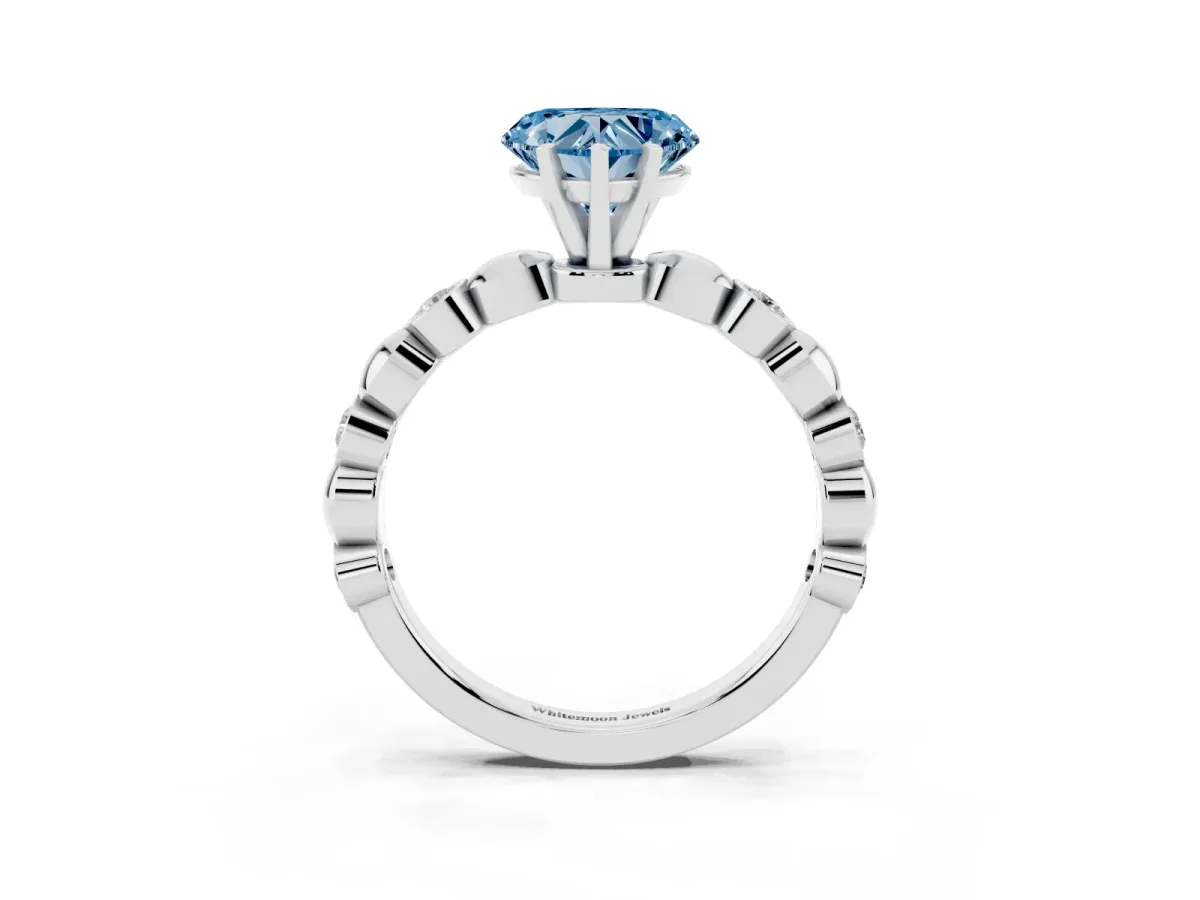 Fancy Blue Heart Cut Solitaire Bezel-Set Diamond Ring with Beaded Band and Four-Prong Setting Silver