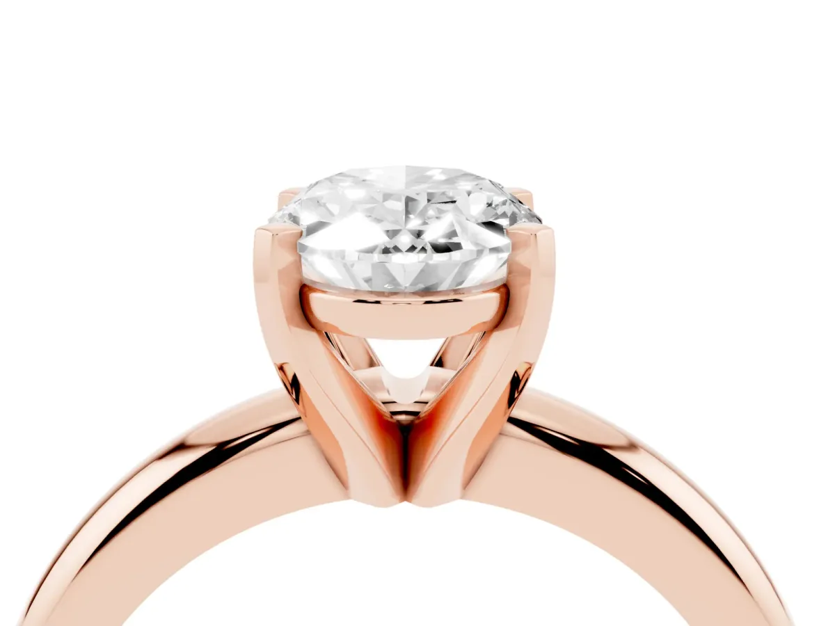 Oval Cut Diamond Solitaire Engagement Ring with Round Band and Four-Prong Setting Rose gold