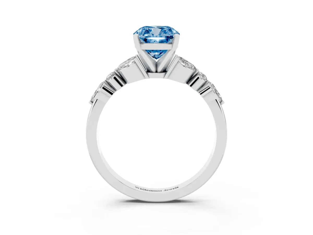 Fancy Blue Cushion Cut Diamond Solitaire Ring with Side Stones and Four-Prong Setting Silver