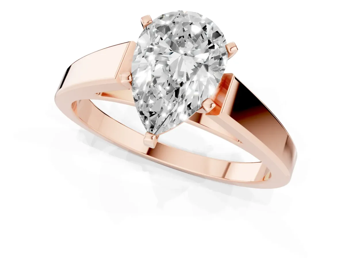 Pear Cut Solitaire Engagement Ring with Four-Prong Setting and Tapered Band Rose gold
