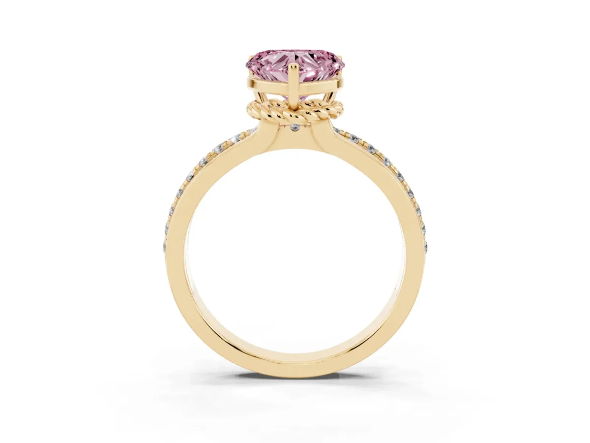 Fancy Pink Heart Cut Solitaire Diamond Ring with Channel Set Band and Six-Prong Setting Yellow gold