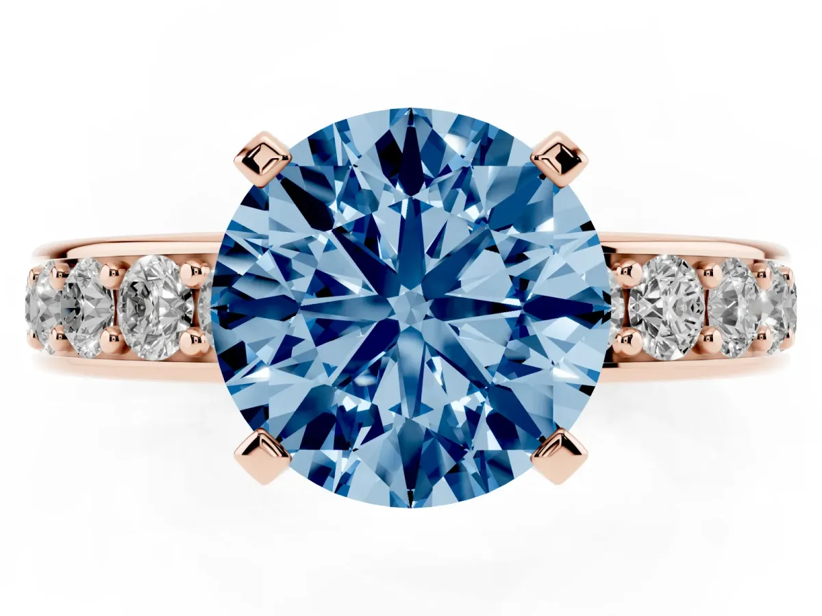 Fancy Blue Round Cut Diamond Engagement Ring with Channel Set Round Band and Prong Setting Rose gold