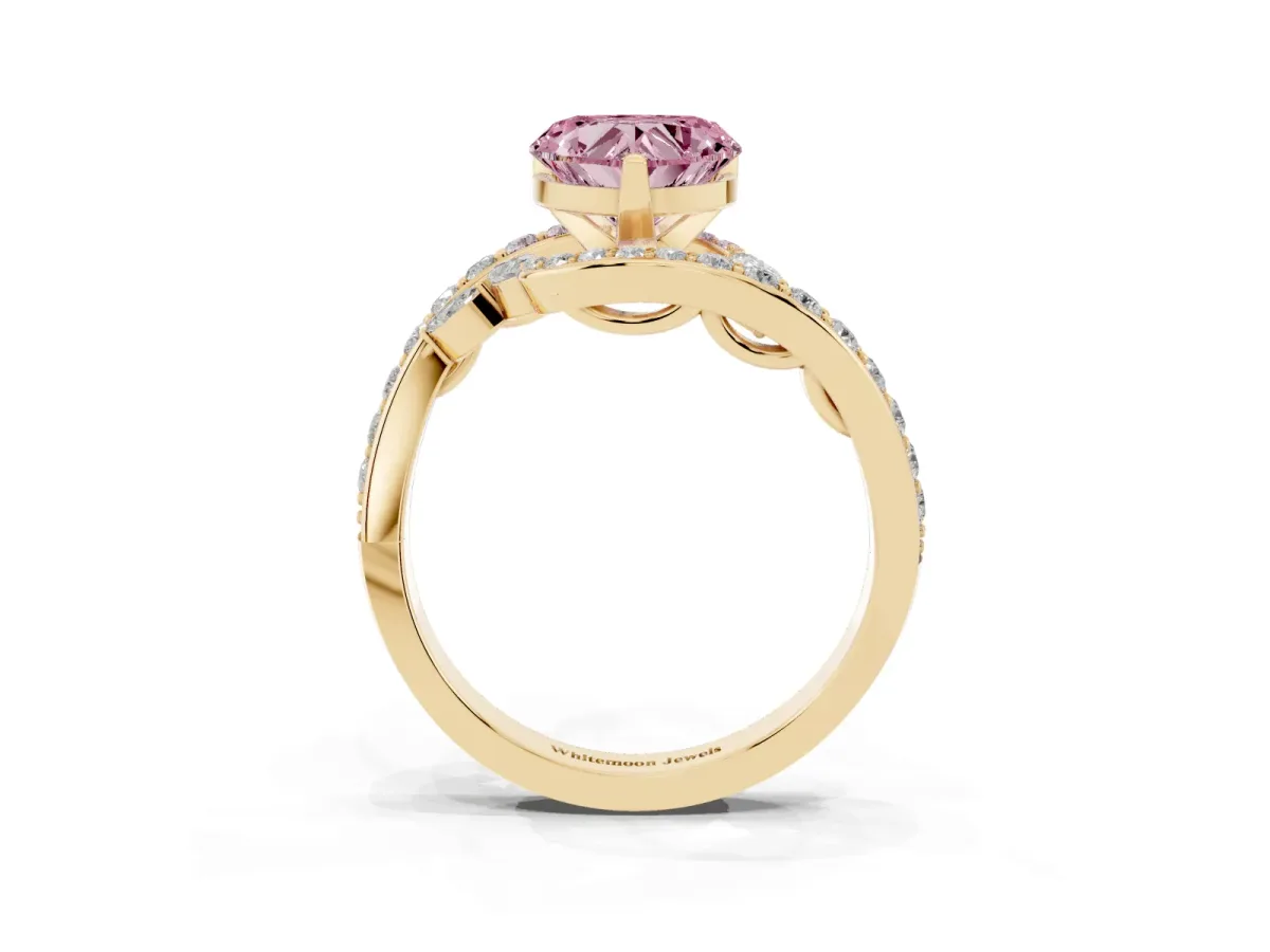 Fancy Pink Heart Cut Solitaire with Pavé Twist Band and Four-Prong Setting Yellow gold