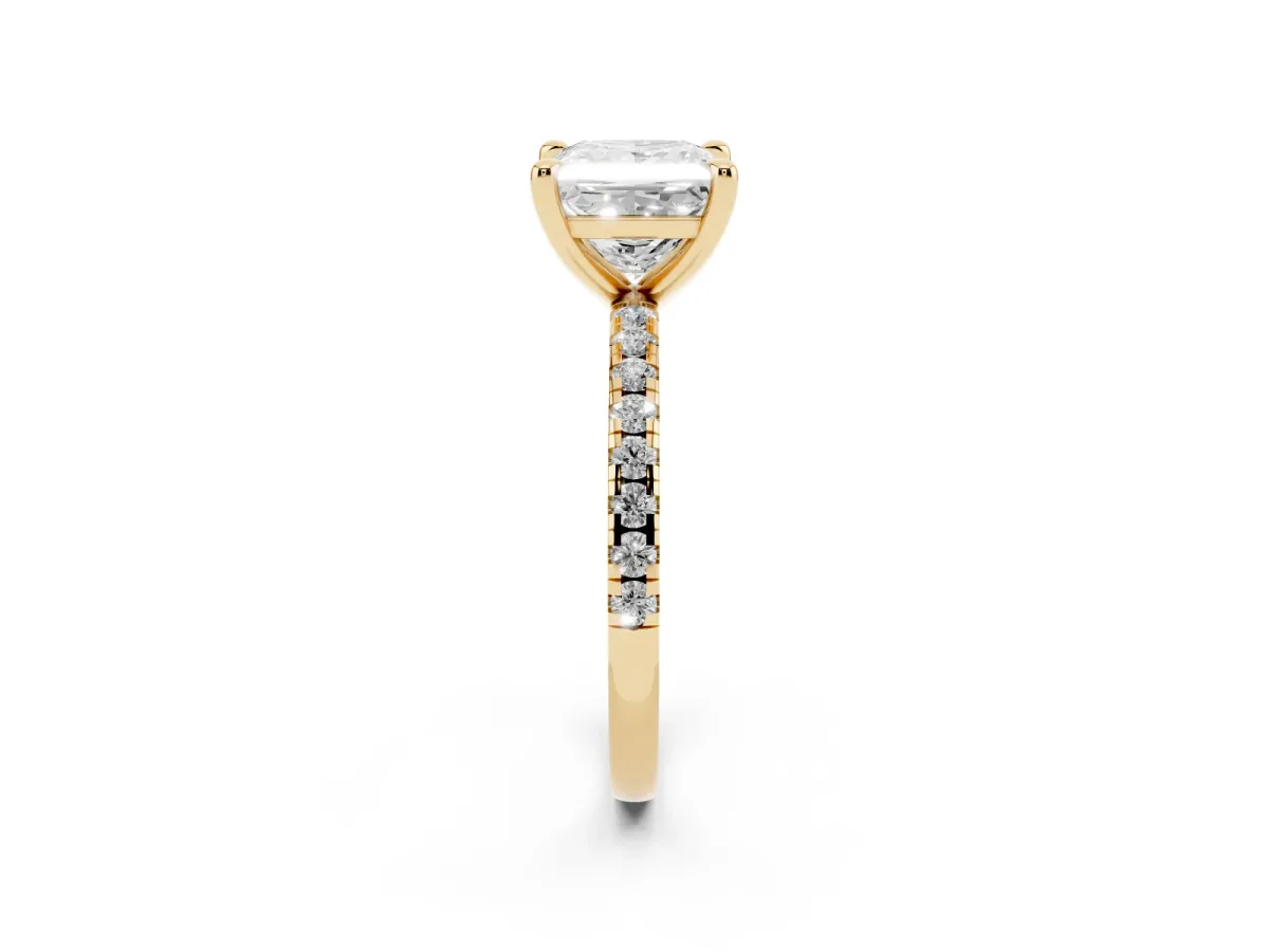 Princess Cut Diamond Brilliant Solitaire Ring with Pavé Band and Four-Prong Setting Yellow gold