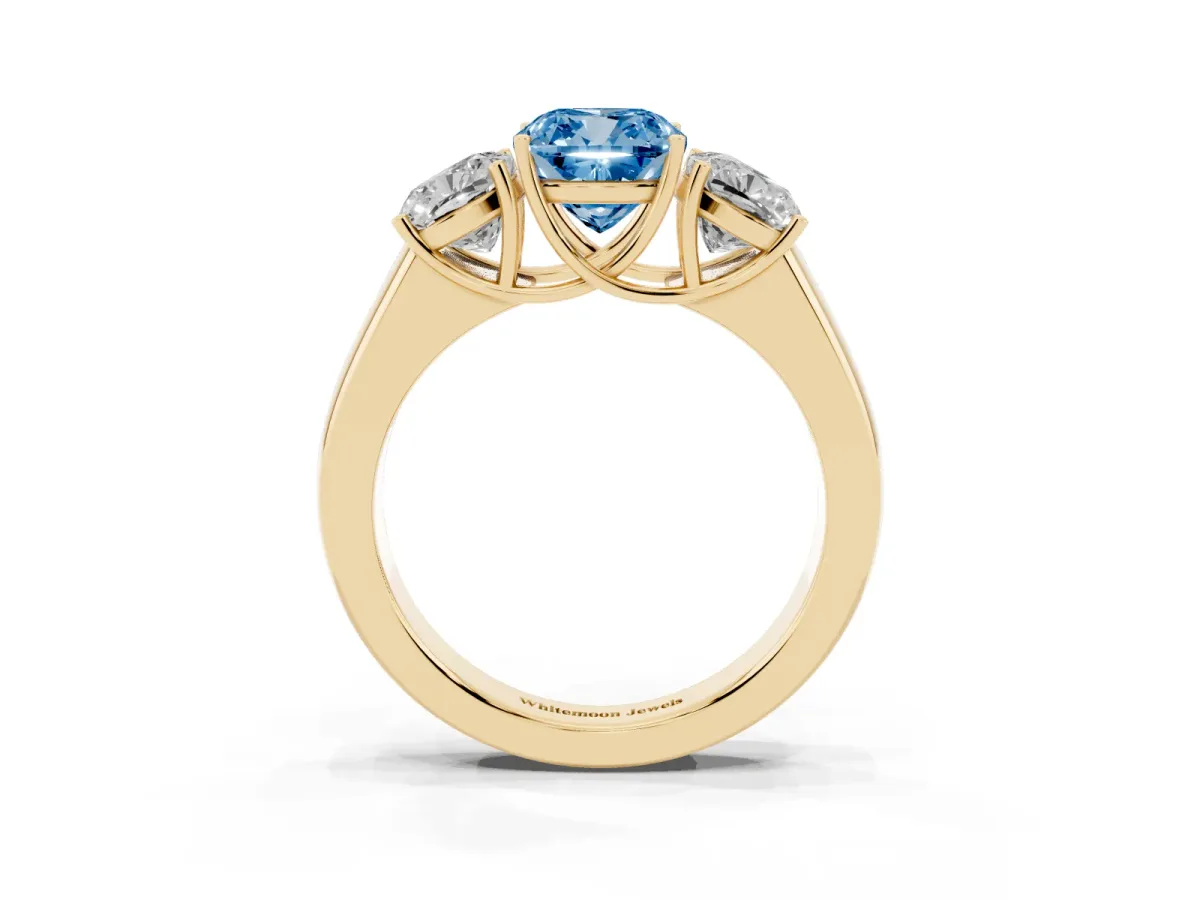 Fancy Blue Three-Stone Cushion Cut Cut Diamond Ring with Prong Setting and Classic Band Yellow gold