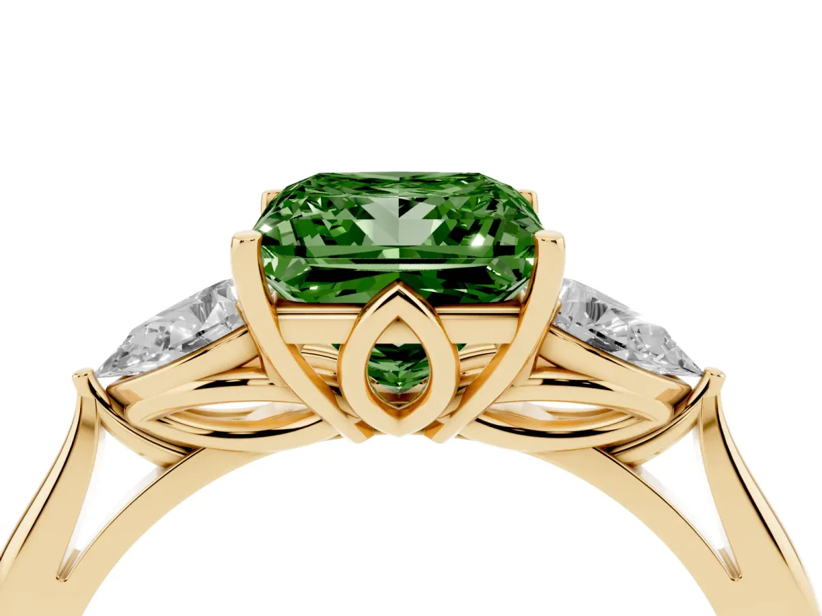 Fancy Green Three-Stone Princess Cut Diamond Ring with Pear Side Stones in Four-Prong Setting Yellow gold