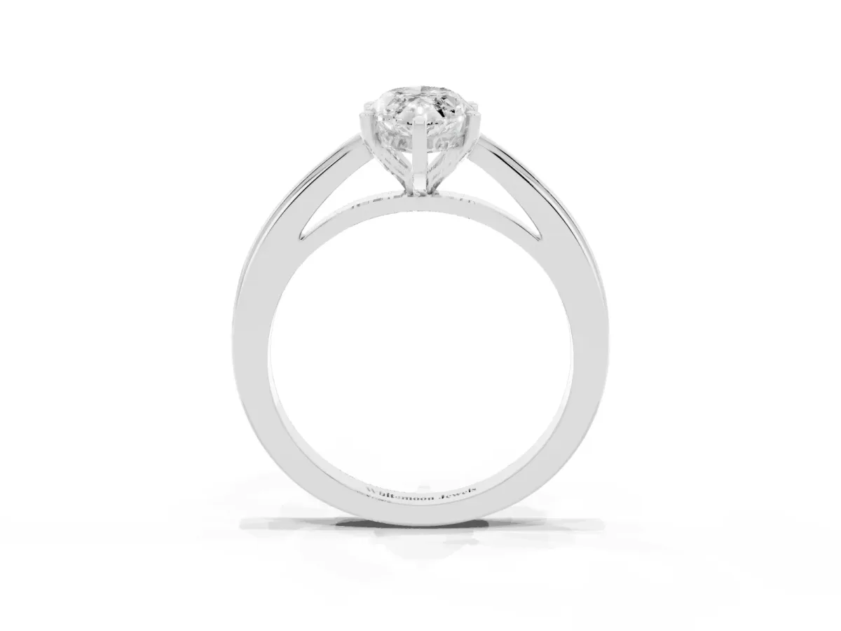 Marquise Cut Solitaire Diamond Ring with Four-Prong Setting and Classic Band Silver