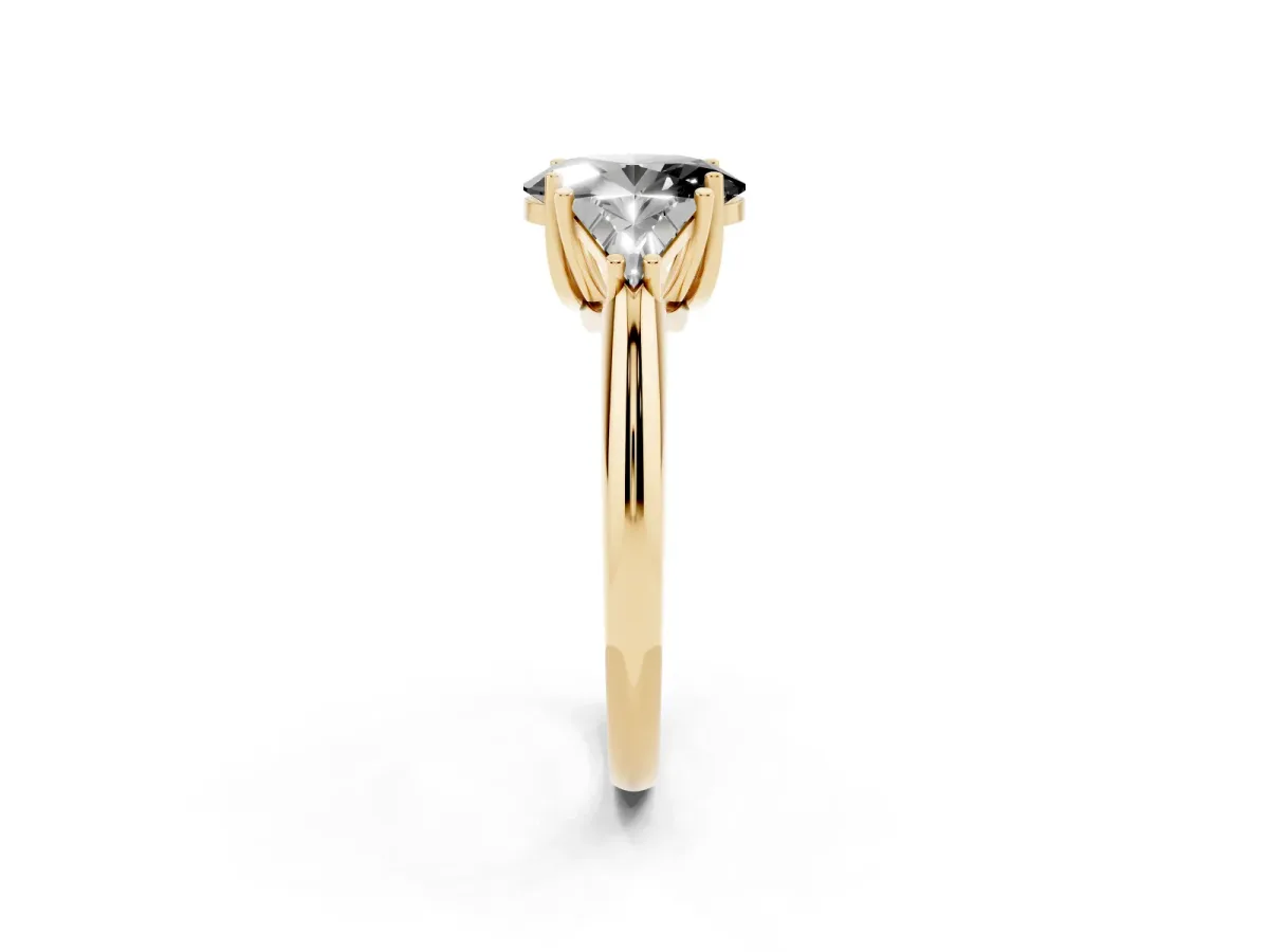 Fancy Black Three-Stone Oval Cut Diamond Engagement Ring with Trillion Side Stones and Prong Setting Yellow gold