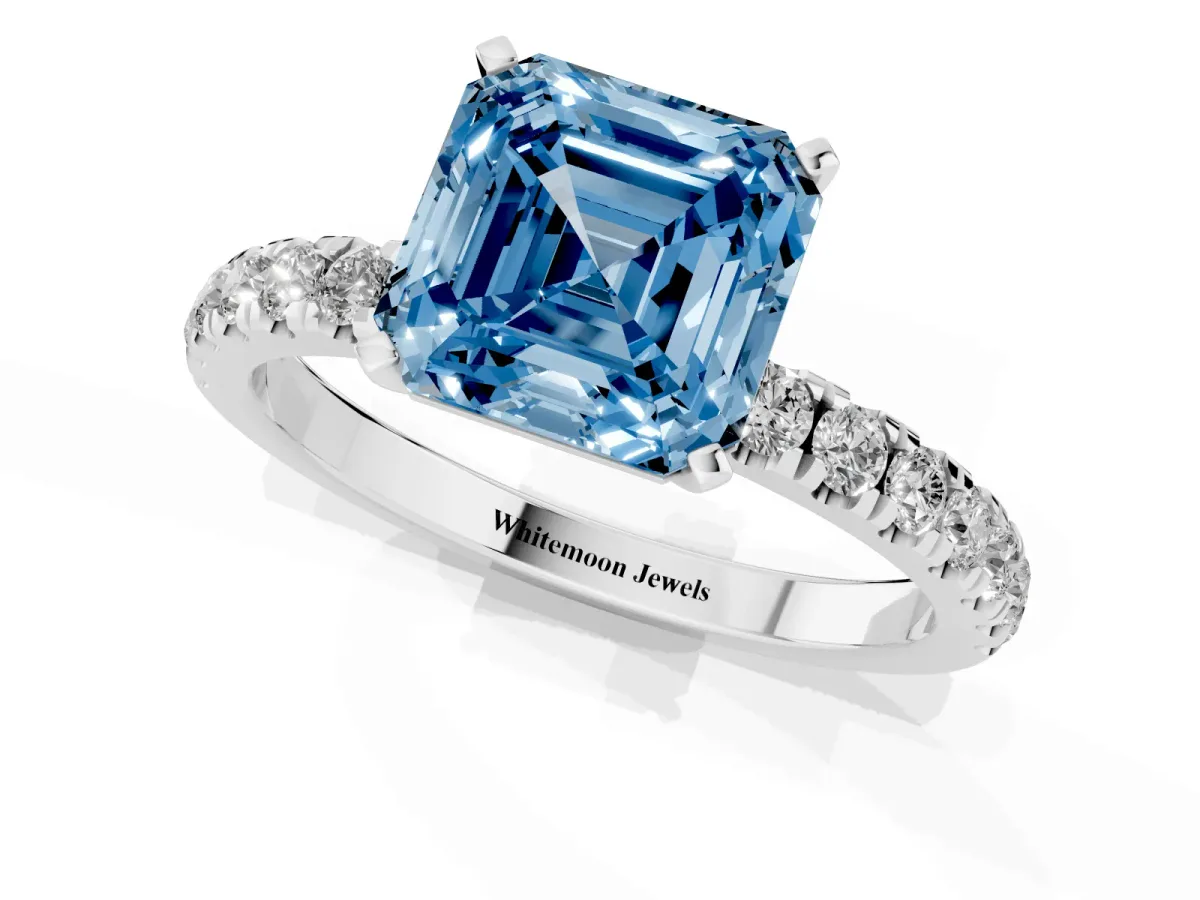 Fancy Blue Asscher Cut Diamond Solitaire Ring with Pavé Accents and Four-Prong Setting Platinum