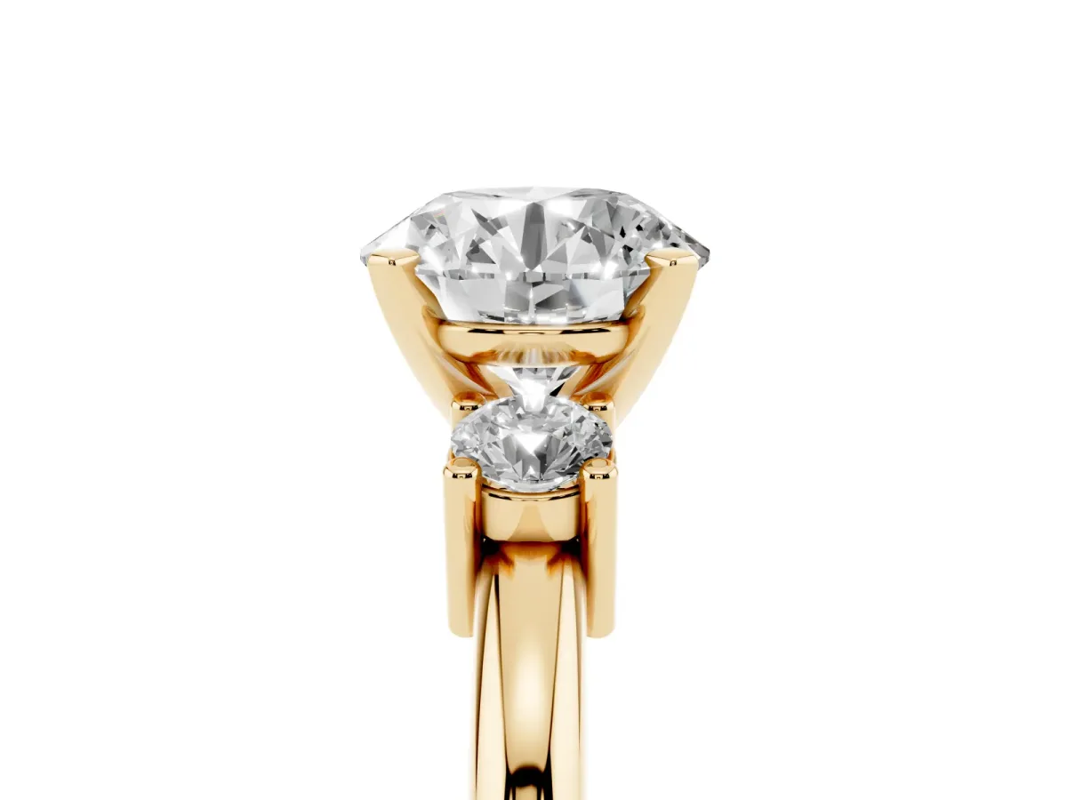 Three-Stone Round Cut Cut Diamond Solitaire with Prong Setting and Classic Band Yellow gold