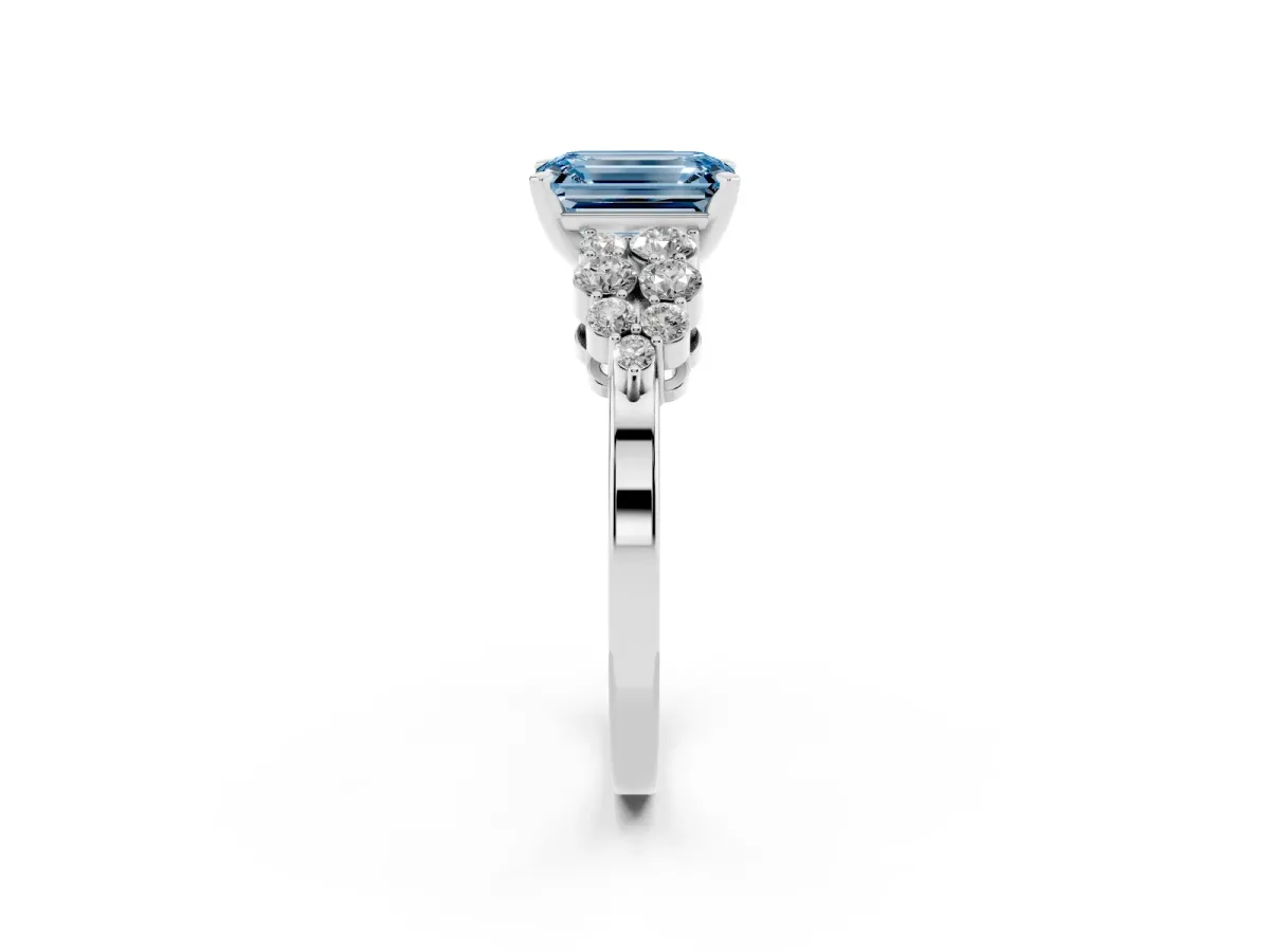 Fancy Blue Emerald Cut Cluster Diamond Engagement Ring with Pavé Band and Four-Prong Setting Silver