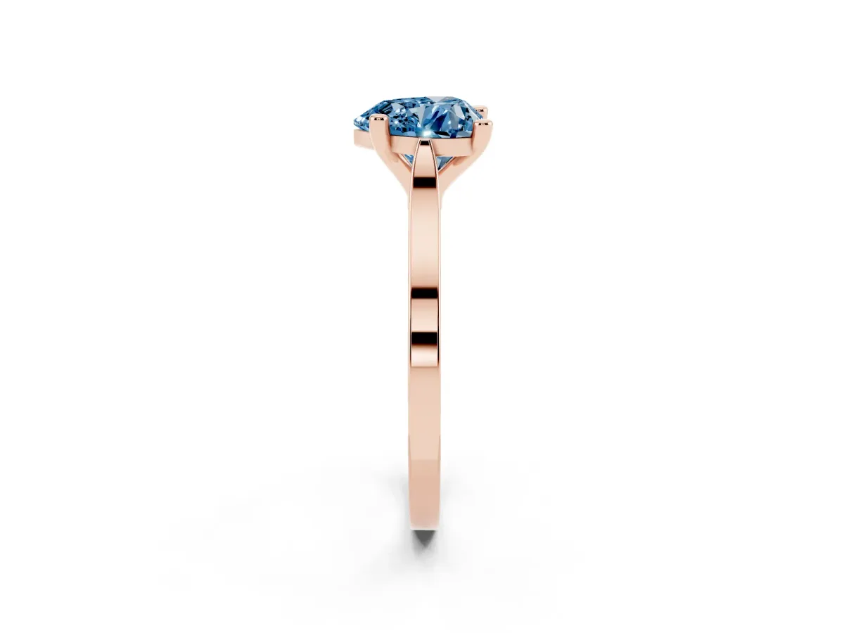 Fancy Blue Heart Cut Solitaire Diamond Ring with Four-Prong Setting and Tapered Band Rose gold