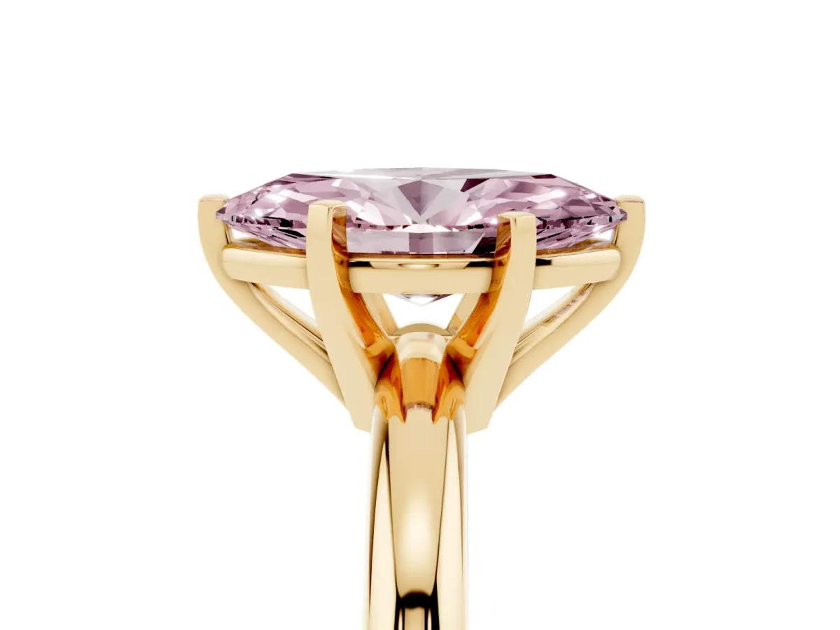 Fancy Pink Marquise Cut Diamond Solitaire Engagement Ring with Round Band and Four-Prong Setting Yellow gold