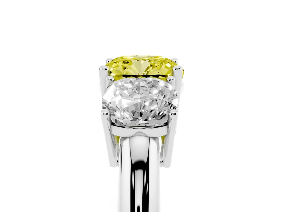 Fancy Yellow Three-Stone Cushion Cut Cut Diamond Engagement Ring with Prong Setting on a White Gold Band White gold