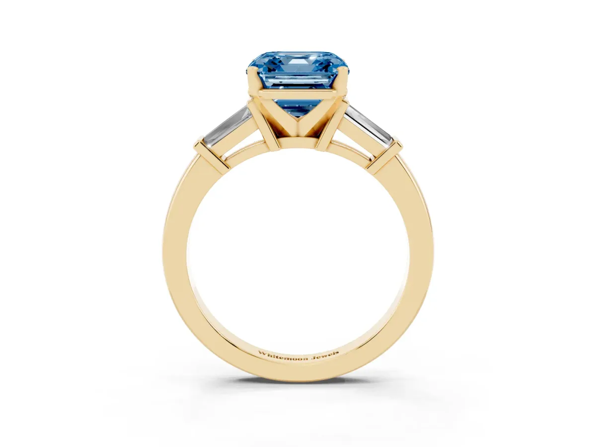 Fancy Blue Asscher Cut Cut Diamond Solitaire Ring with Tapered Baguette Accents and Four-Prong Setting Yellow gold