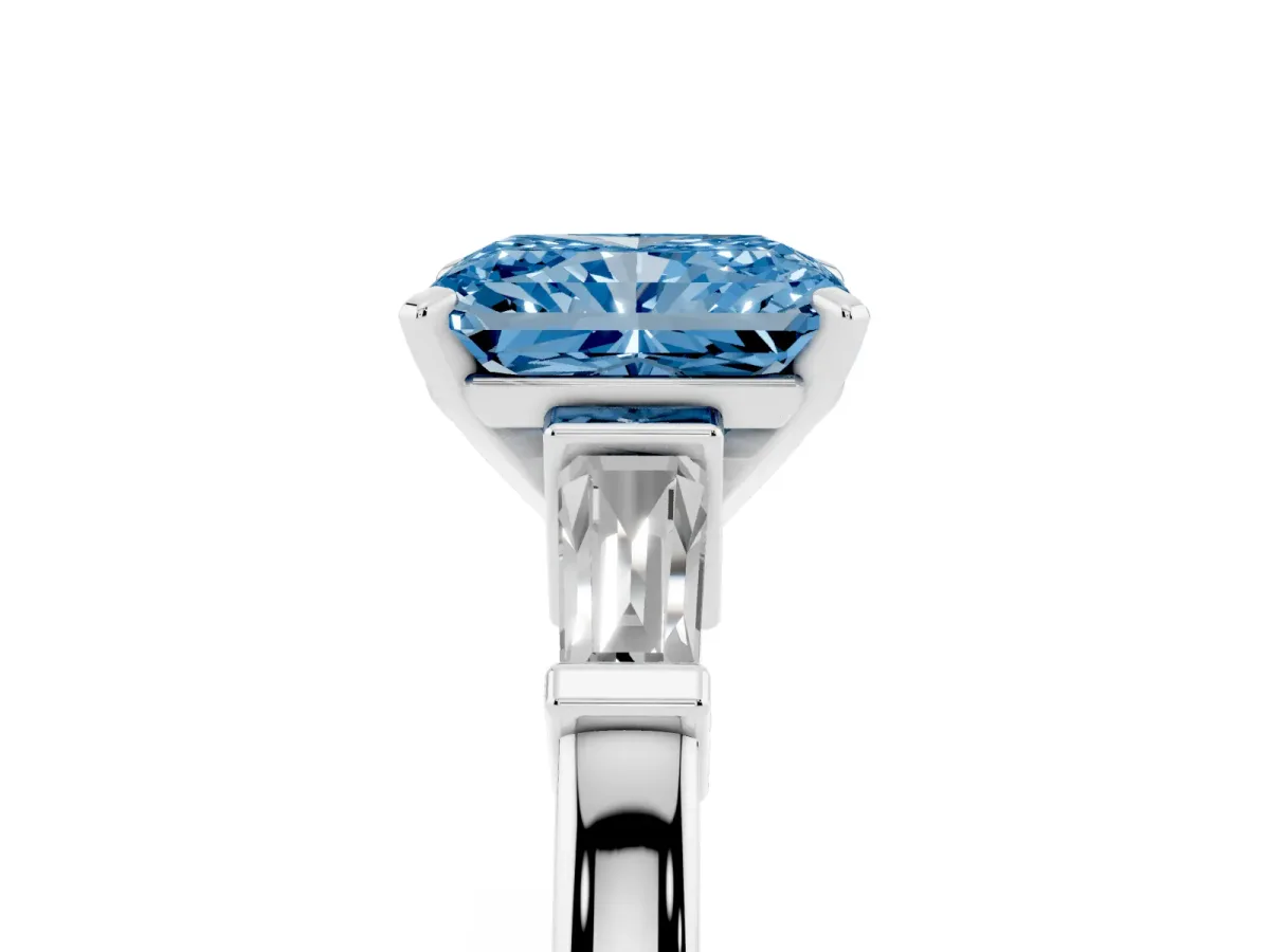 Fancy Blue Radiant Cut Cut Diamond Solitaire Ring with Tapered Baguette Accents and Four-Prong Setting Silver