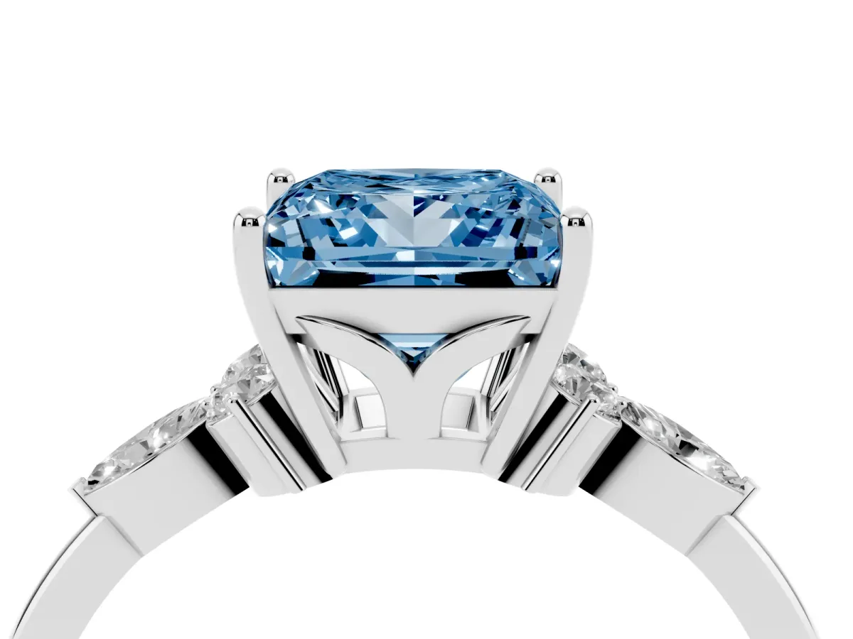 Fancy Blue Princess Cut Brilliant Diamond Solitaire Ring with Pear Side Stones and Four-Prong Setting Silver