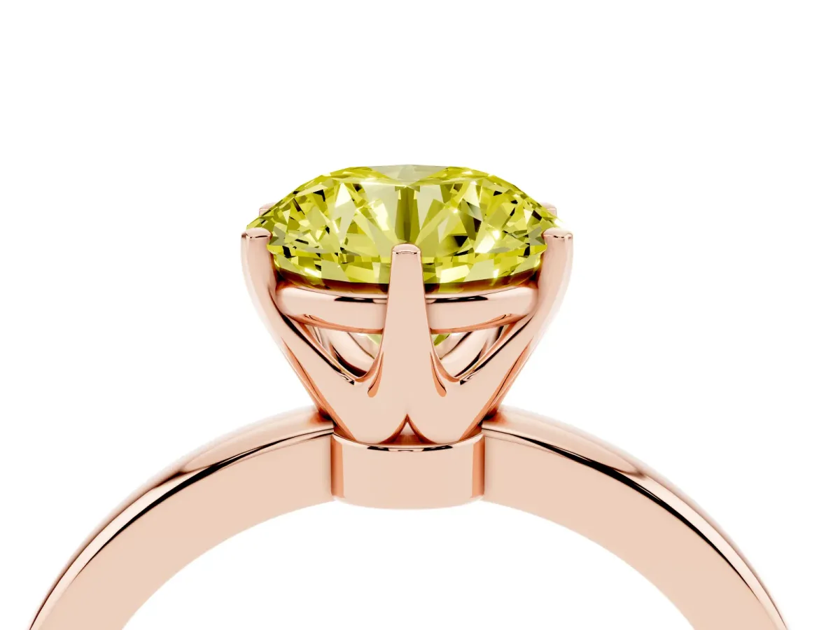 Fancy Yellow Round Cut Solitaire Diamond Ring with Six-Prong Setting on a Classic Band Rose gold