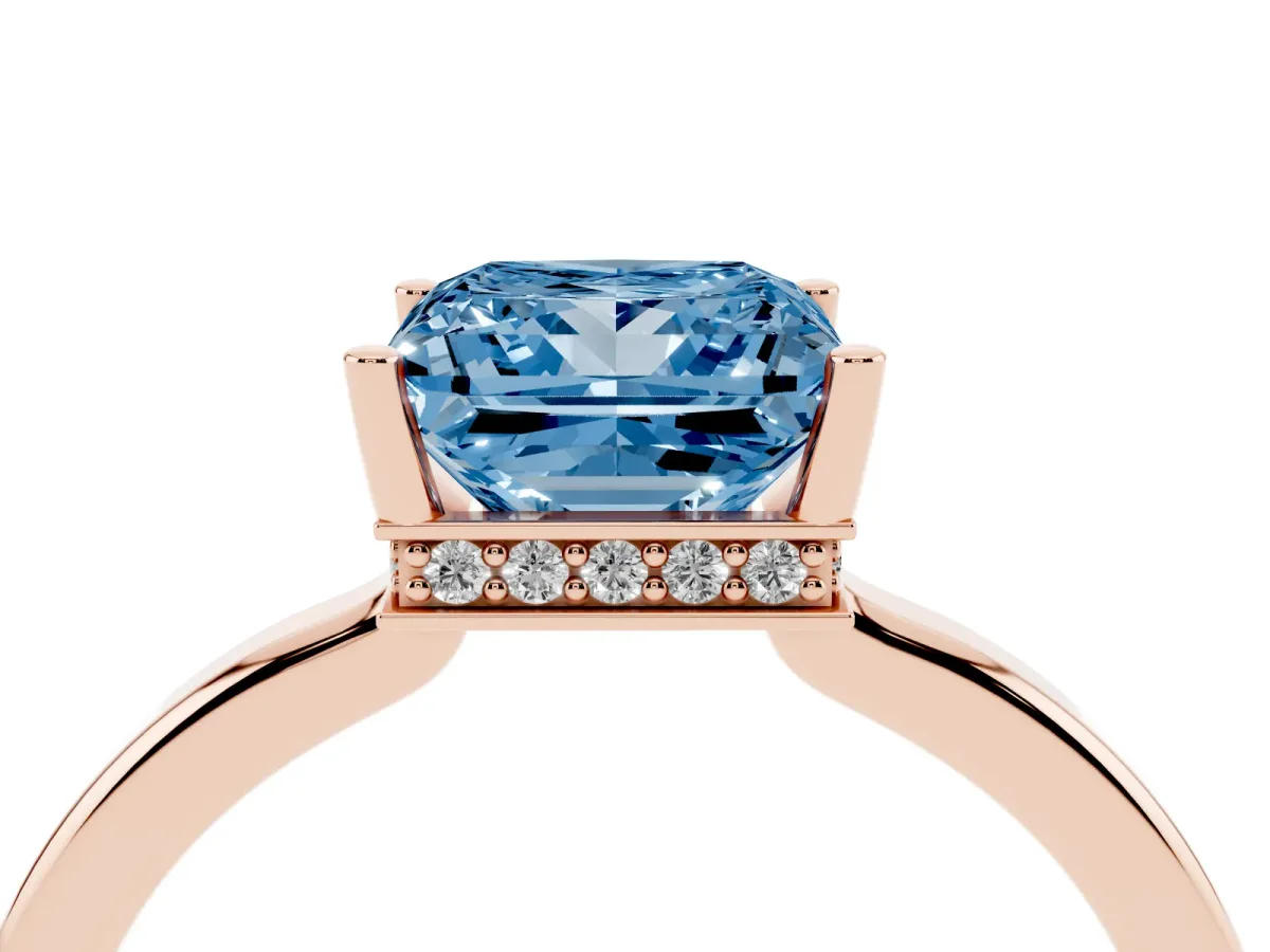 Fancy Blue Princess Cut Cut Solitaire Engagement Ring with Four-Prong Setting on a Classic Band Rose gold