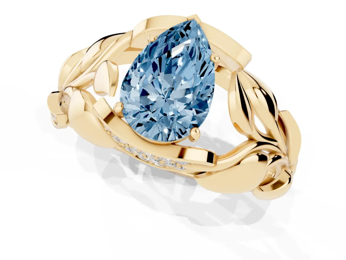 Fancy Blue Pear Cut Diamond Leaf-Inspired Engagement Ring with Round Accents and Prong Setting Yellow gold