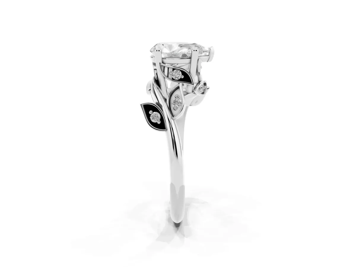 Pear Cut Solitaire Twist Engagement Ring with Leaf Accents and Prong Setting Silver