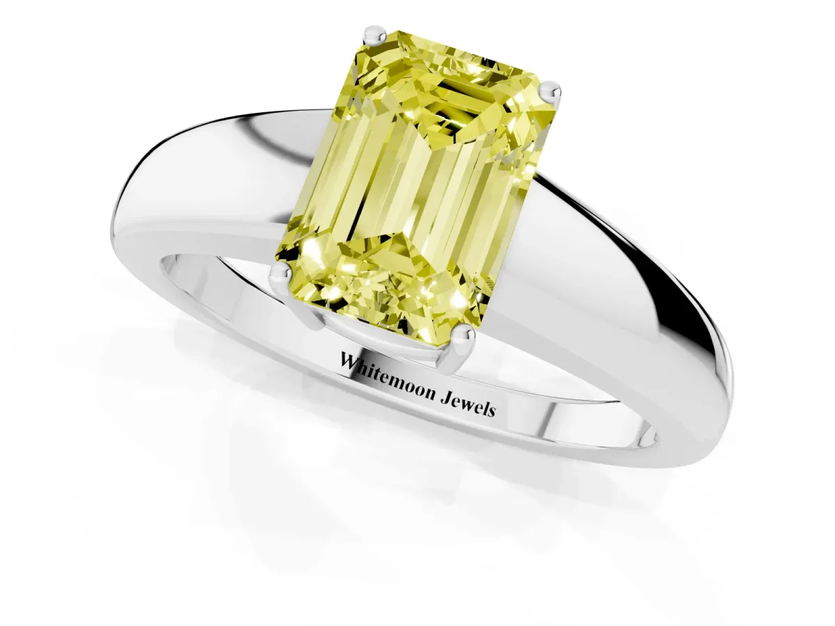 Fancy Yellow Emerald Cut Solitaire Diamond Ring with Tapered Band and Four-Prong Setting Silver