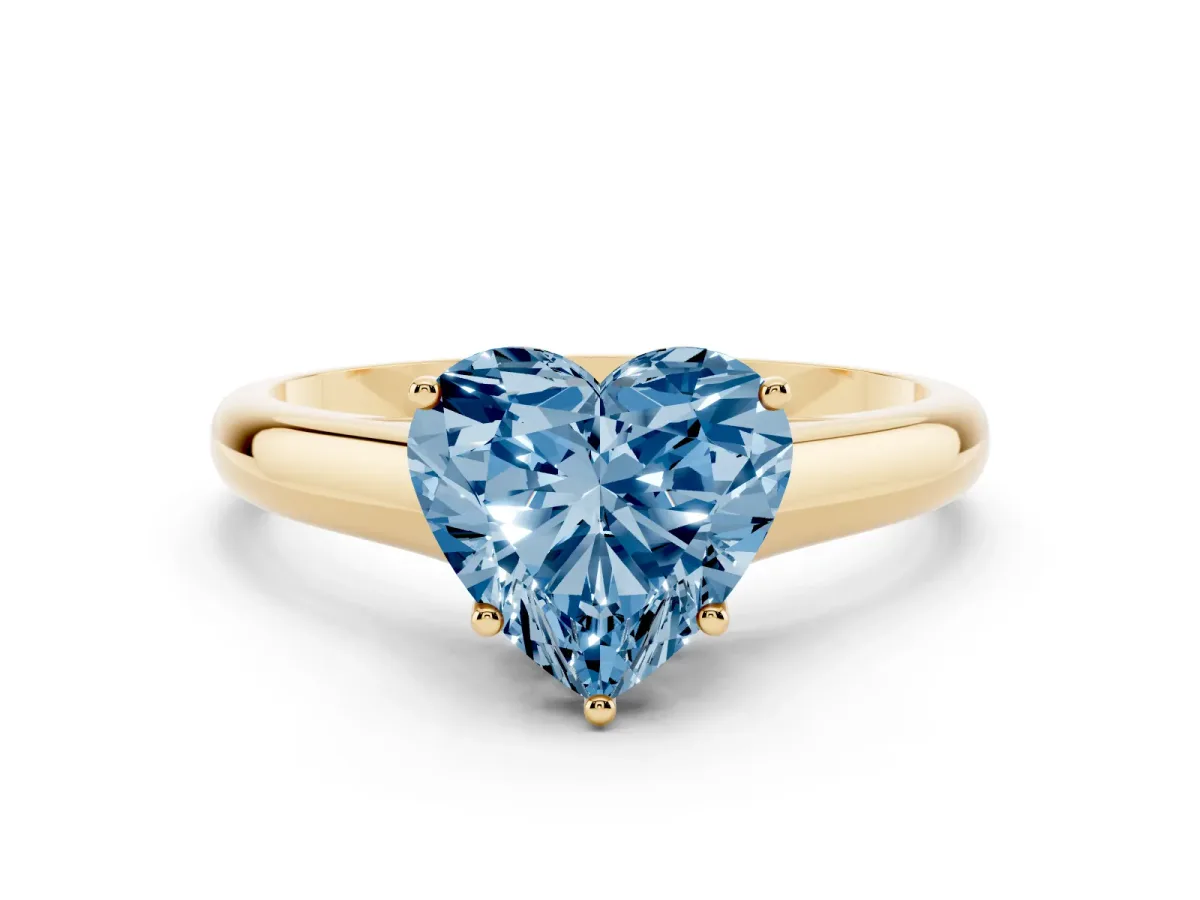 Fancy Blue Heart Cut Cut Diamond Solitaire Engagement Ring with Tapered Plain Band and Four-Prong Setting Yellow gold