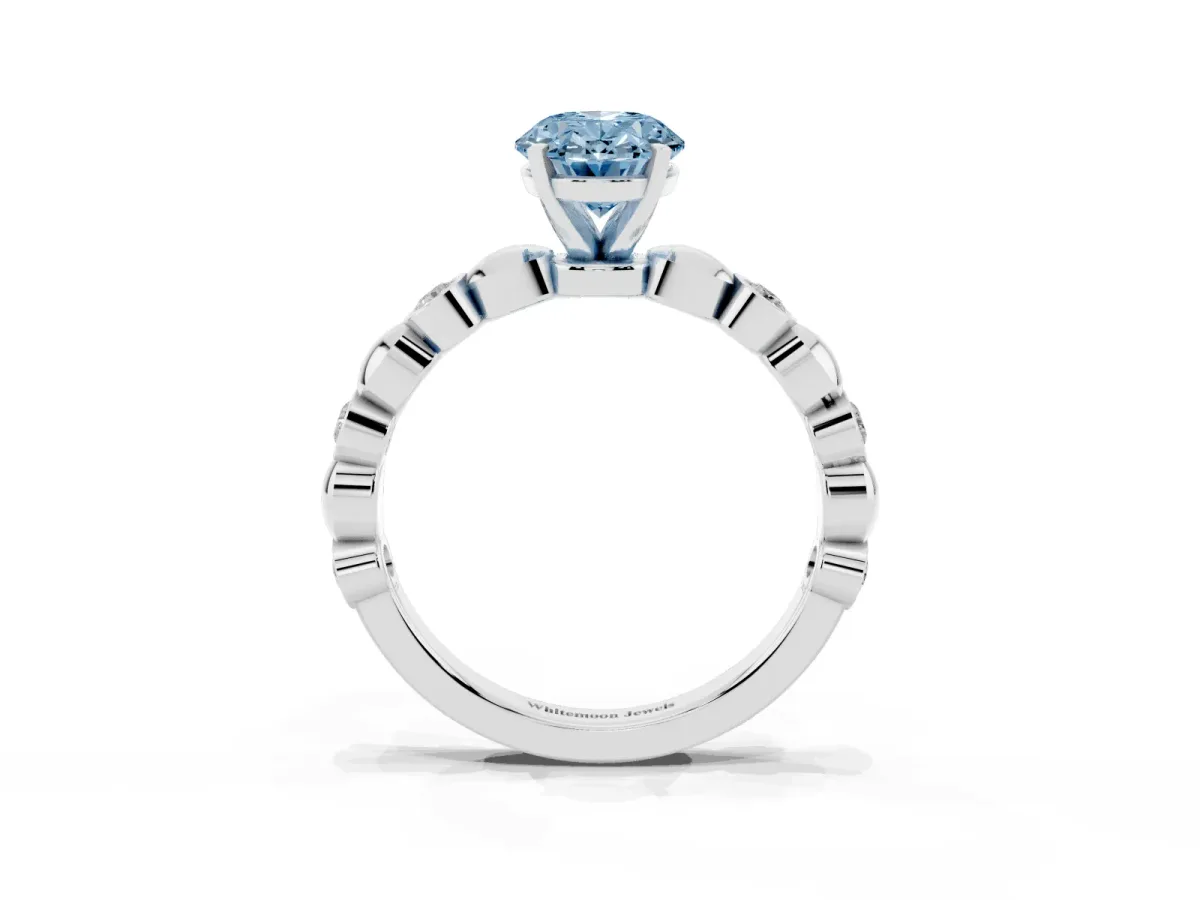 Fancy Blue Oval Cut Solitaire Bezel-Set Diamond Ring with Beaded Band and Four-Prong Setting Silver