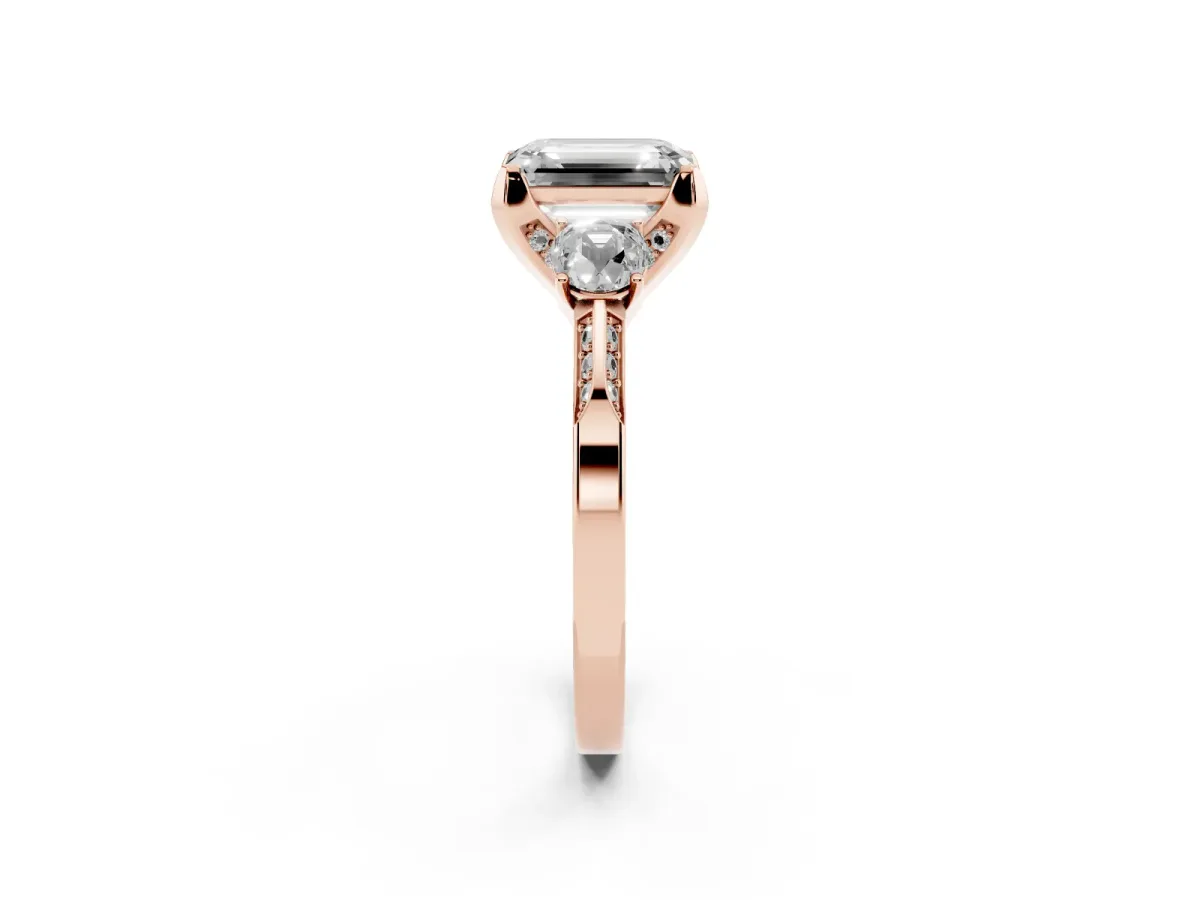 Fancy Blue Emerald Cut Brilliant Three-Stone Diamond Ring with Pavé Band and Four-Prong Setting Rose gold