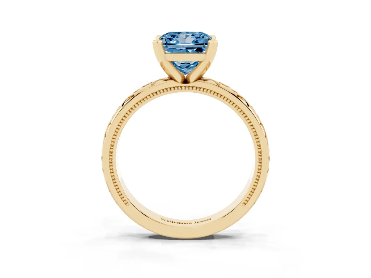 Fancy Blue Princess Cut Solitaire Engagement Ring with Scrollwork Band and Four-Prong Setting Yellow gold