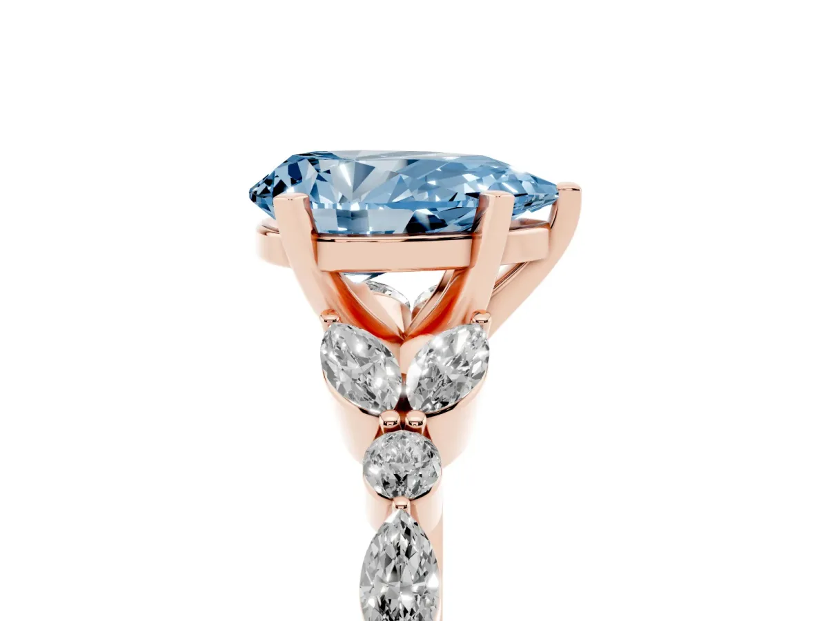 Fancy Blue Pear Cut Diamond Solitaire Ring with Side Stones and Four-Prong Setting Rose gold