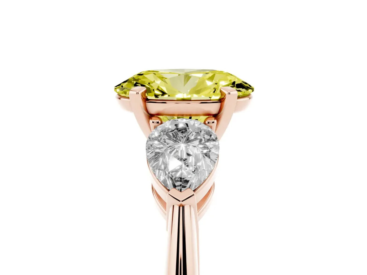 Fancy Yellow Three-Stone Oval Cut Diamond Ring with Pear Side Stones and Four-Prong Setting Rose gold