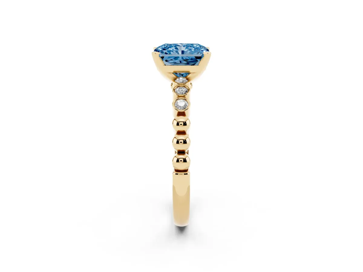Fancy Blue Radiant Cut Solitaire Bezel Accent Diamond Engagement Ring with Beaded Band and Four-Prong Setting Yellow gold