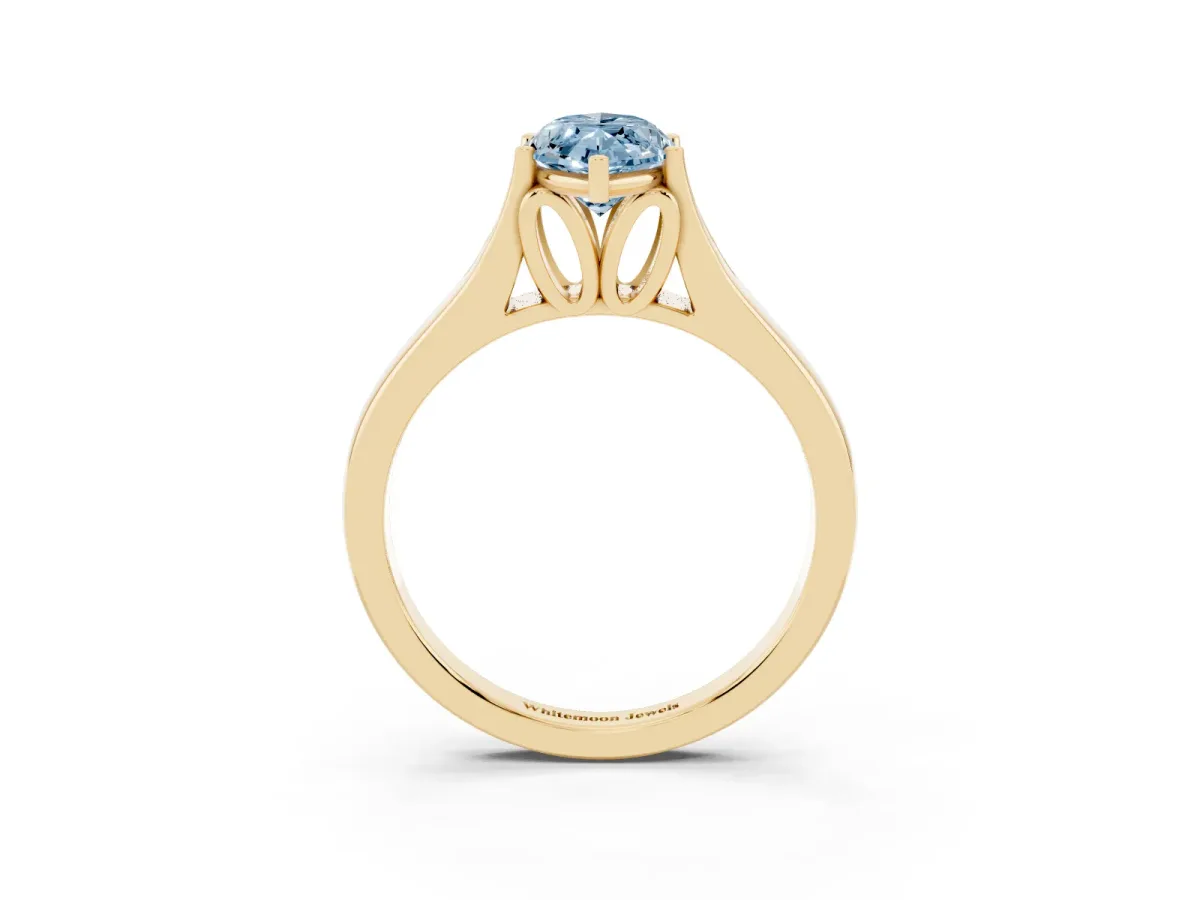 Fancy Blue Marquise Cut Solitaire Diamond Ring with Cathedral Band and Four-Prong Setting Yellow gold